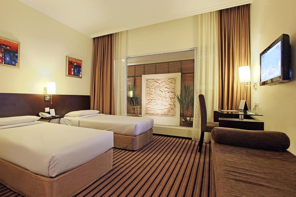 Harmoni One Convention Hotel And Service Apartments Batam Exteriör bild